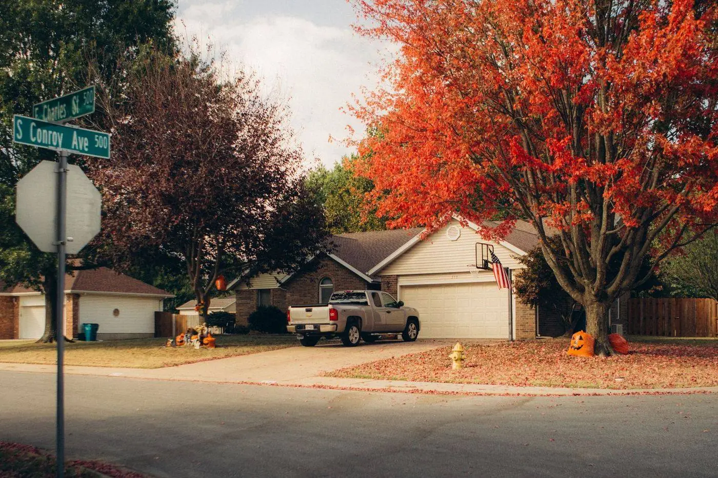 Tree-lined suburban street with single-family homes in Parlin, New Jersey
