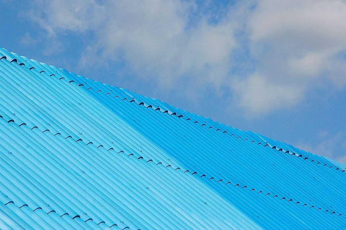 Close-up of a rubber pipe boot flashing around a plumbing vent stack